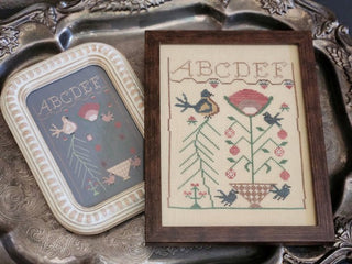 Sitting Pretty | Cross Stitch Pattern by 1884 Stitchery Designs
