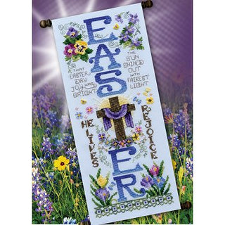 Cross-stitched Easter banner with floral elements and religious symbols on a floral background
