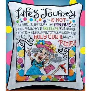 Decorative pillow with cross-stitched design featuring a cartoon character and text on a colorful background.