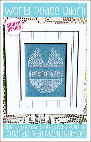 Cross-stitch pattern for a bikini with 'Peace' text, framed in a decorative border.