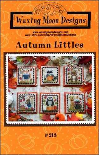 A booklet cover for 'Autumn Littles' cross stitch pattern featuring small, colorful, animal-themed embroidery designs on a quilted background with autumn leaves.